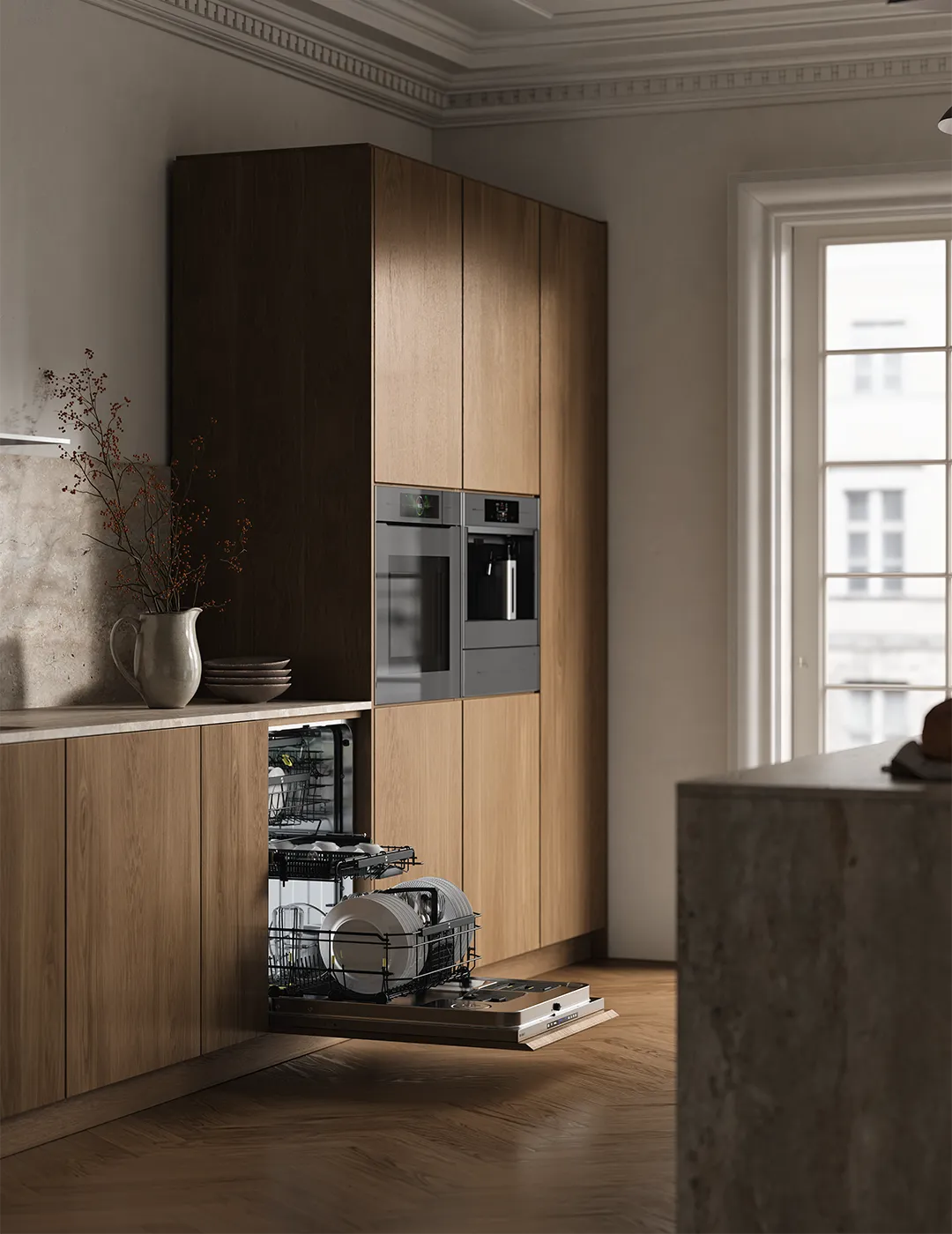 ASKO integrated dishwasher open in a Scandinavian-style kitchen with oak cabinetry, built-in oven and coffee machine. ASKO integrated dishwasher open in a Scandinavian-style kitchen with oak cabinetry, built-in oven and coffee machine.