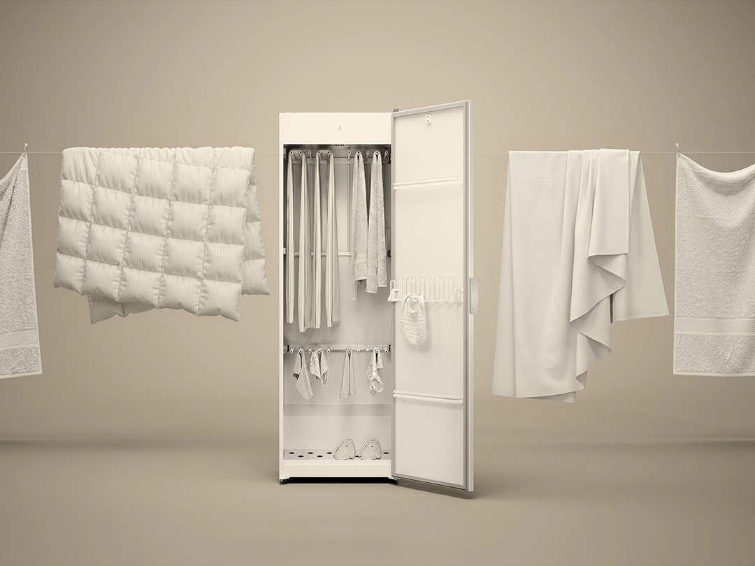 Open ASKO drying cabinet with hanging rails and hooks, surrounded by towels, bedding and garments, offering up to 16 metres of drying space. Open ASKO drying cabinet with hanging rails and hooks, surrounded by towels, bedding and garments, offering up to 16 metres of drying space.