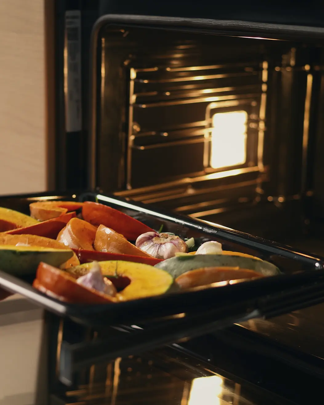 Roasted pumpkins on a oven tray Roasted pumpkins on a oven tray